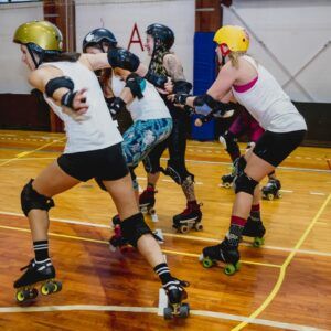 Ladies playing roller derby