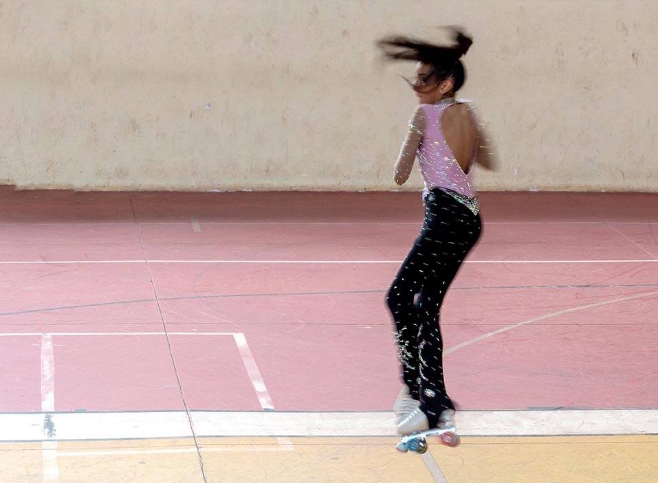 Artistic skater mid jump Artistic skater mid jump